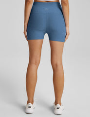 blue high-waisted biker shorts with a 3" inseam.