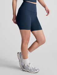 blue high-waisted 5" inseam biker shorts.