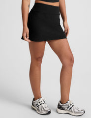 black a-line skirt with built-in shorts with pockets.