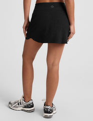 black a-line skirt with built-in shorts with pockets.
