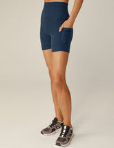 blue high-waisted 5" biker shorts.
