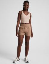 brown mid-rise 3" inseam shorts with pockets.