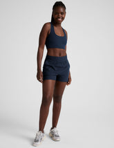blue mid-rise spacedye shorts with pockets.