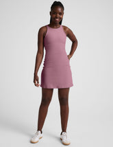 pink high-neck racerback mini dress.
