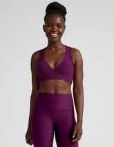 purple v-neck sports bra with remove-able pads.