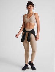 brown v-neck active bra with self lining and remove-able bra pads.