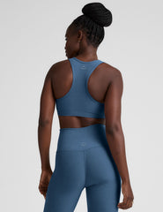 blue v-neck racerback bra with remove-able pads.