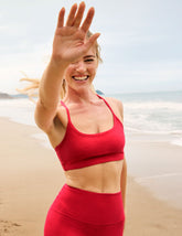 red racerback bra with slim straps.