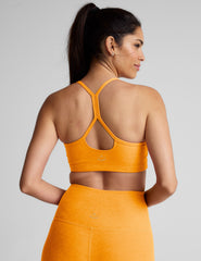 orange racerback bra with slim straps.
