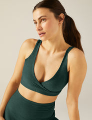 green bra top with a crossover design in front