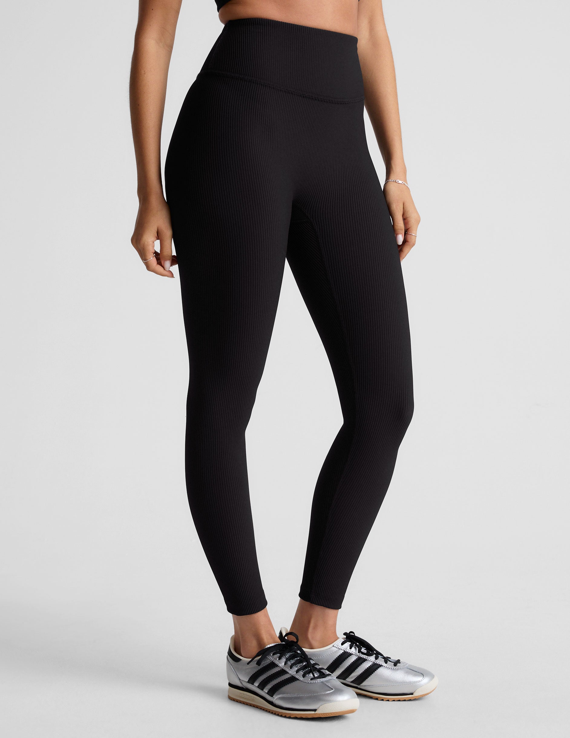 black midi length ribbed leggings with a 4" waistband. 