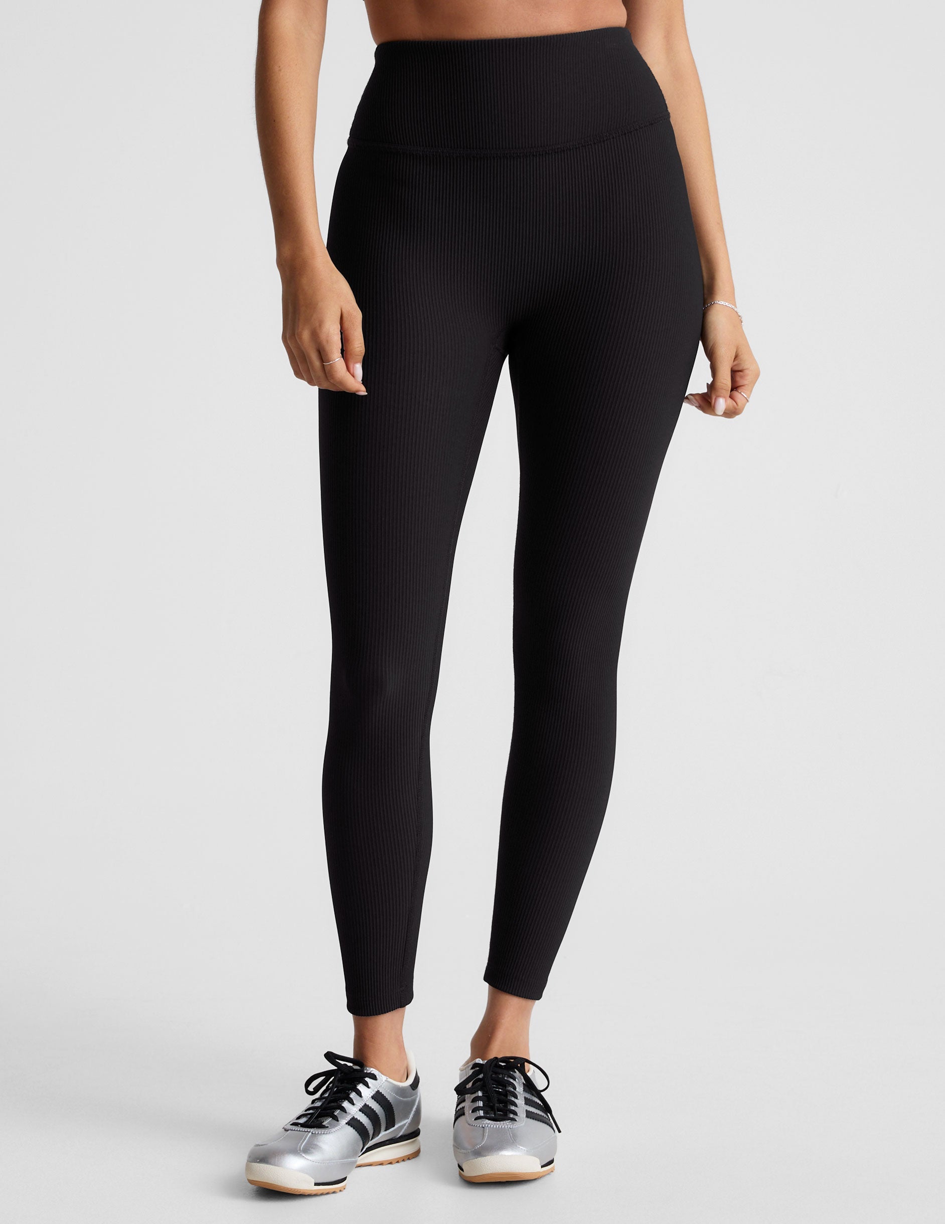 black midi length ribbed leggings with a 4" waistband. 