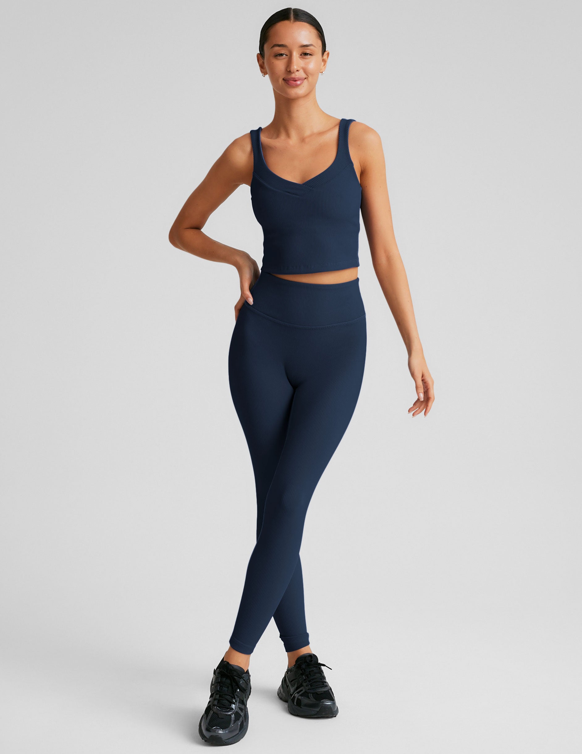 blue high-waisted midi ribbed leggings.