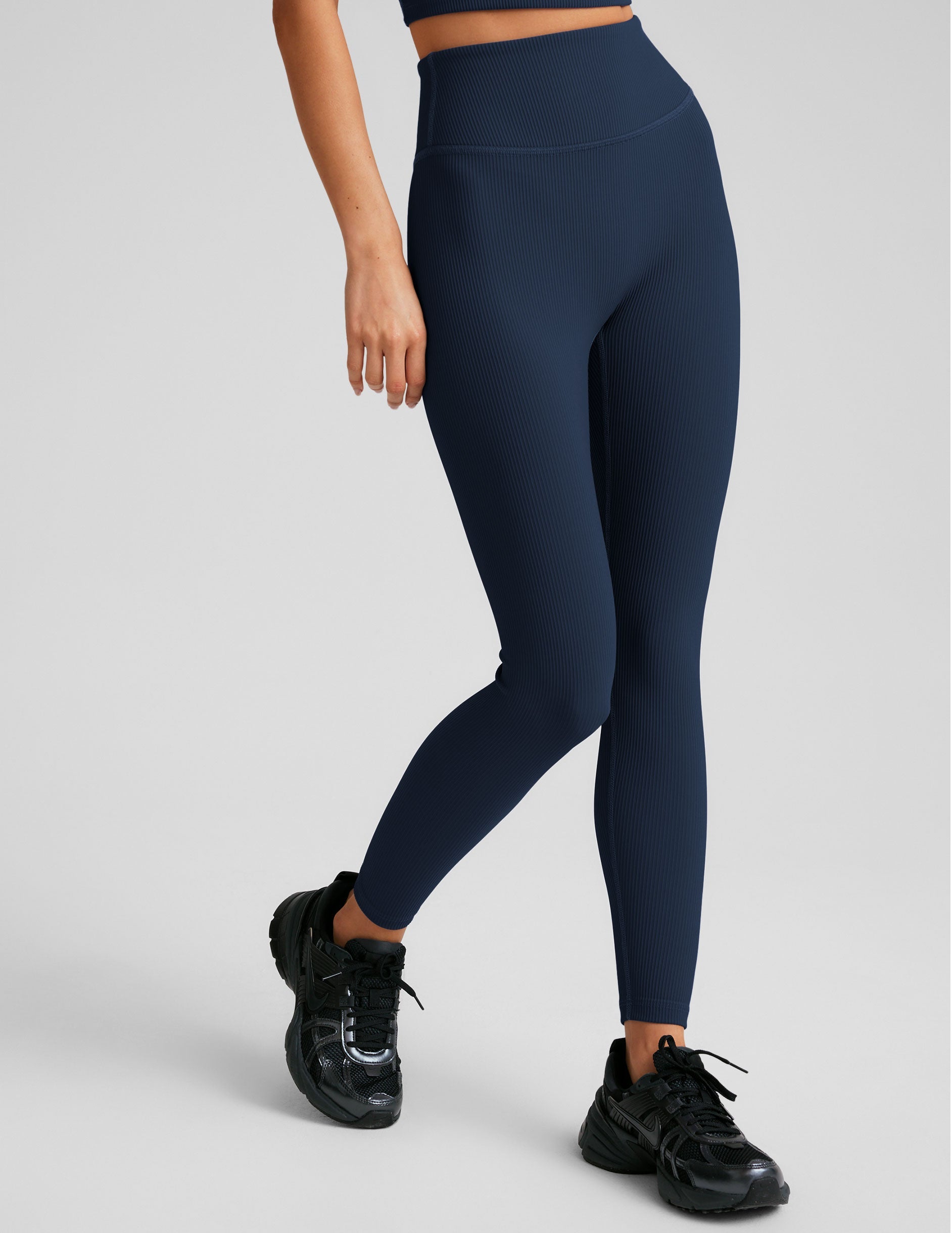 blue high-waisted midi ribbed leggings.