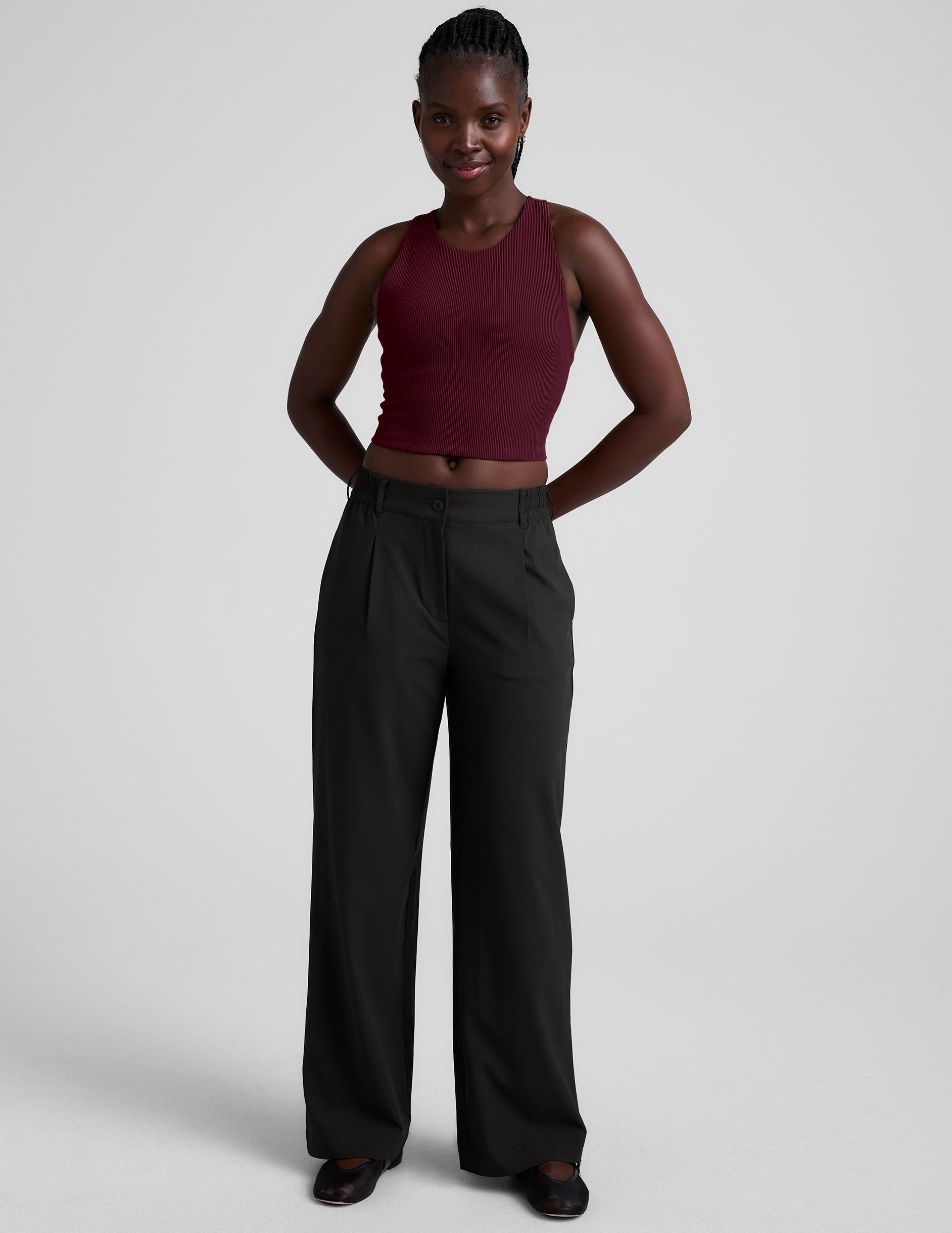 red ribbed high-neck cropped racerback tank.