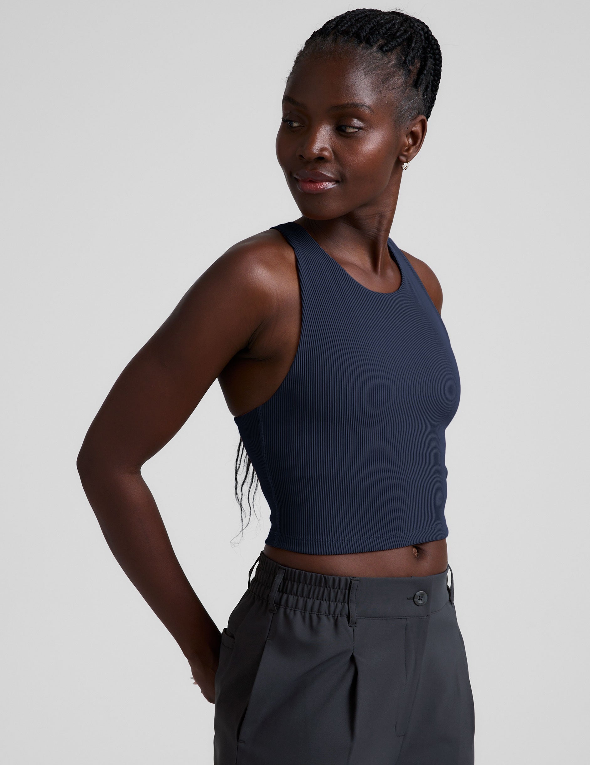 blue high-neck ribbed cropped racerback tank.