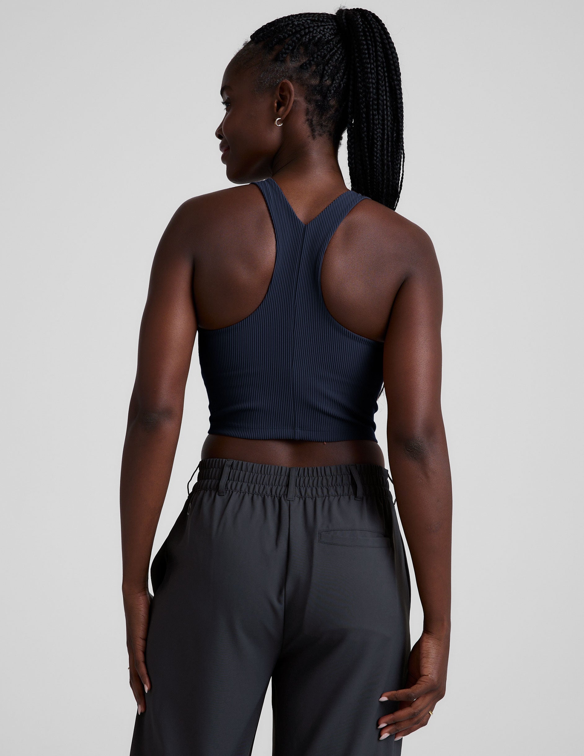 blue high-neck ribbed cropped racerback tank.