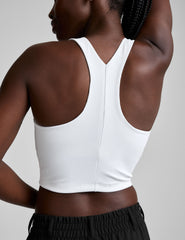 white high-neck ribbed cropped racerback tank.