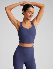 blue ribbed cropped tank with a soft front and back v neckline.