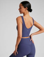 blue ribbed cropped tank with a soft front and back v neckline.