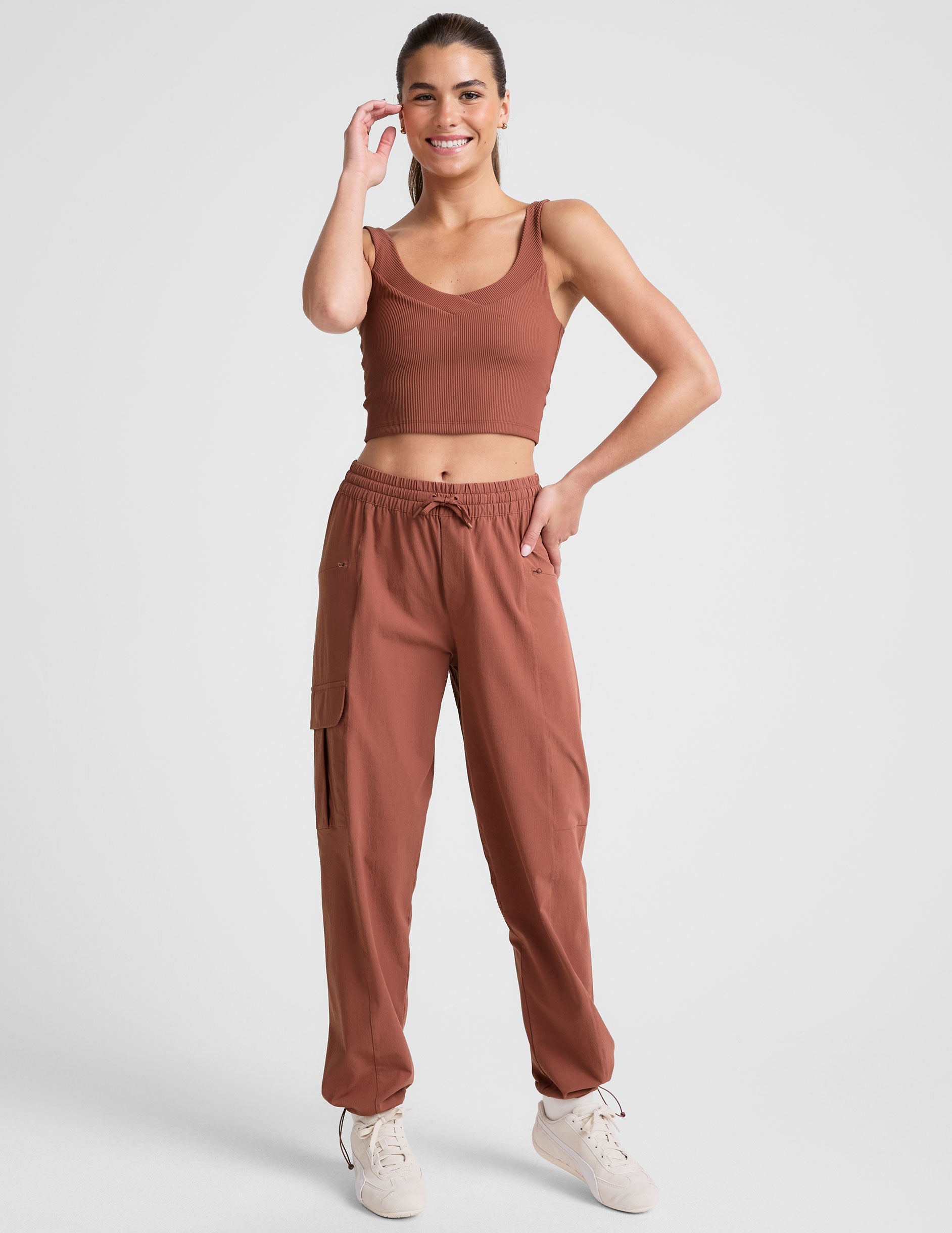 red ribbed cropped tank top with a soft front and back v neckline.