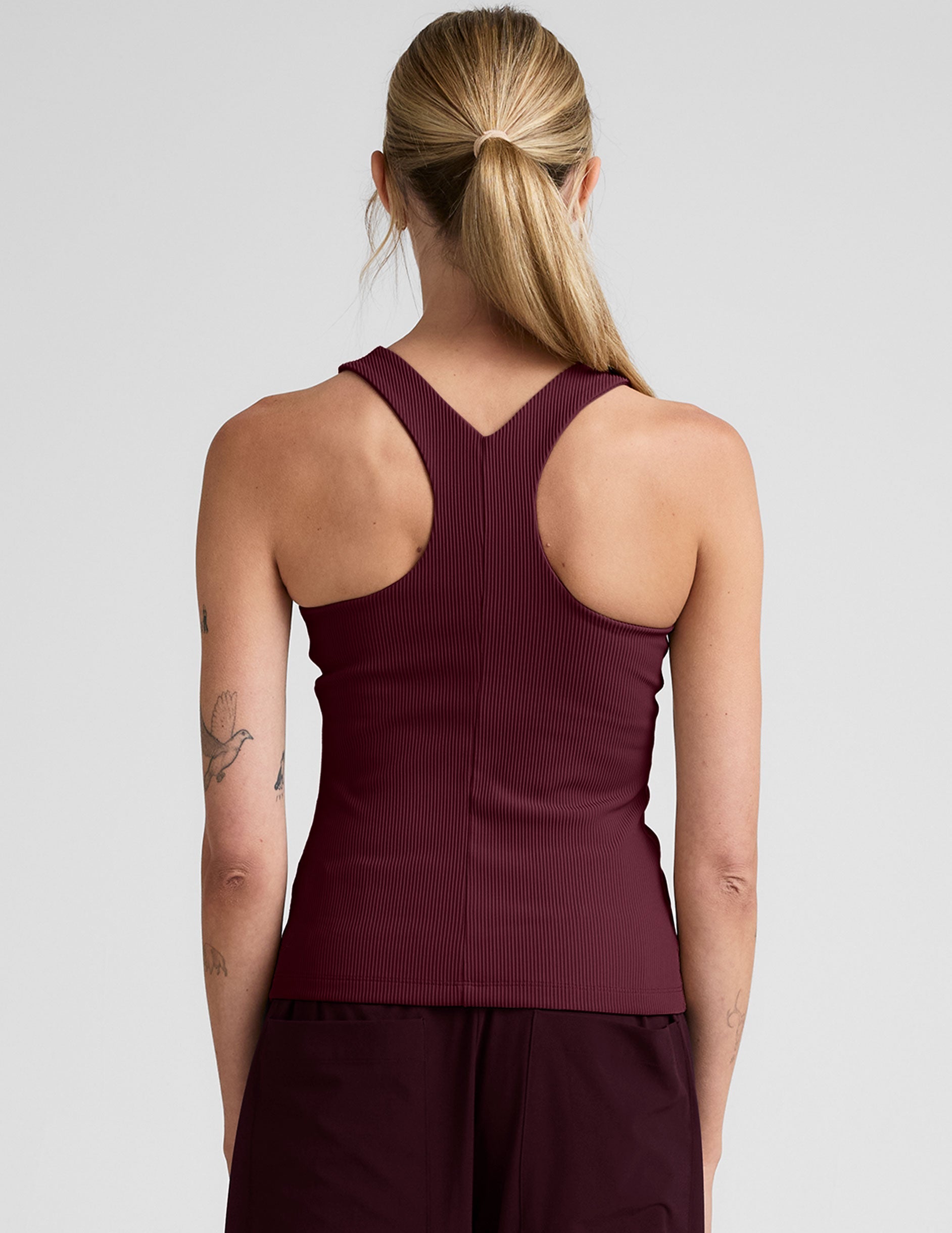 red high-neck ribbed racerback tank.