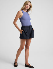 blue ribbed high-neck tank top.