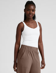 white ribbed tank top with a soft front and back v neckline.