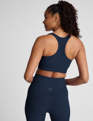 blue racerback bra with a scoop neckline​
and overlapping hemband detail​. 