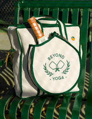 green and white beyond yoga pickleball tote bag.