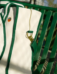 green and white beyond yoga pickleball tote bag.