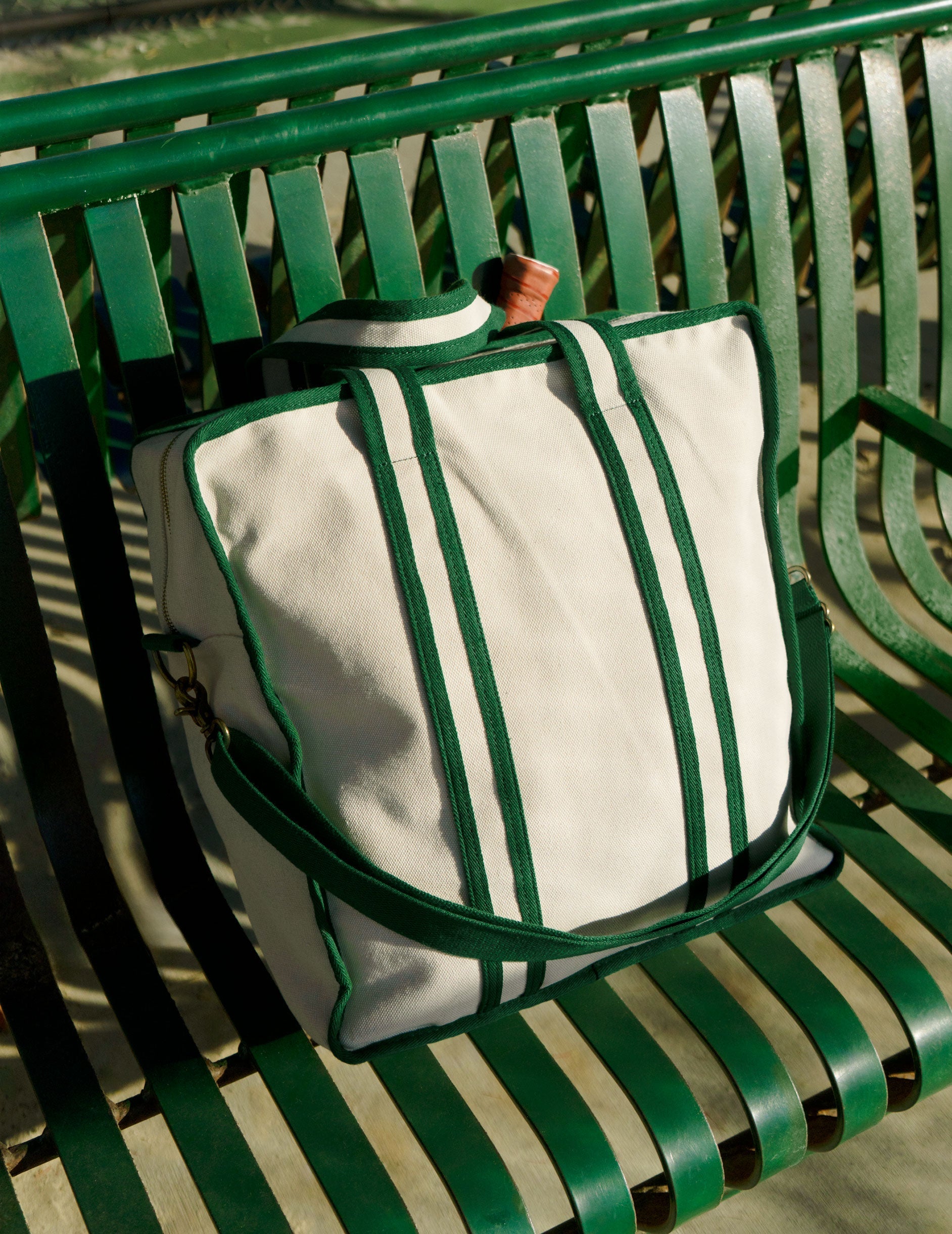 green and white beyond yoga pickleball tote bag.