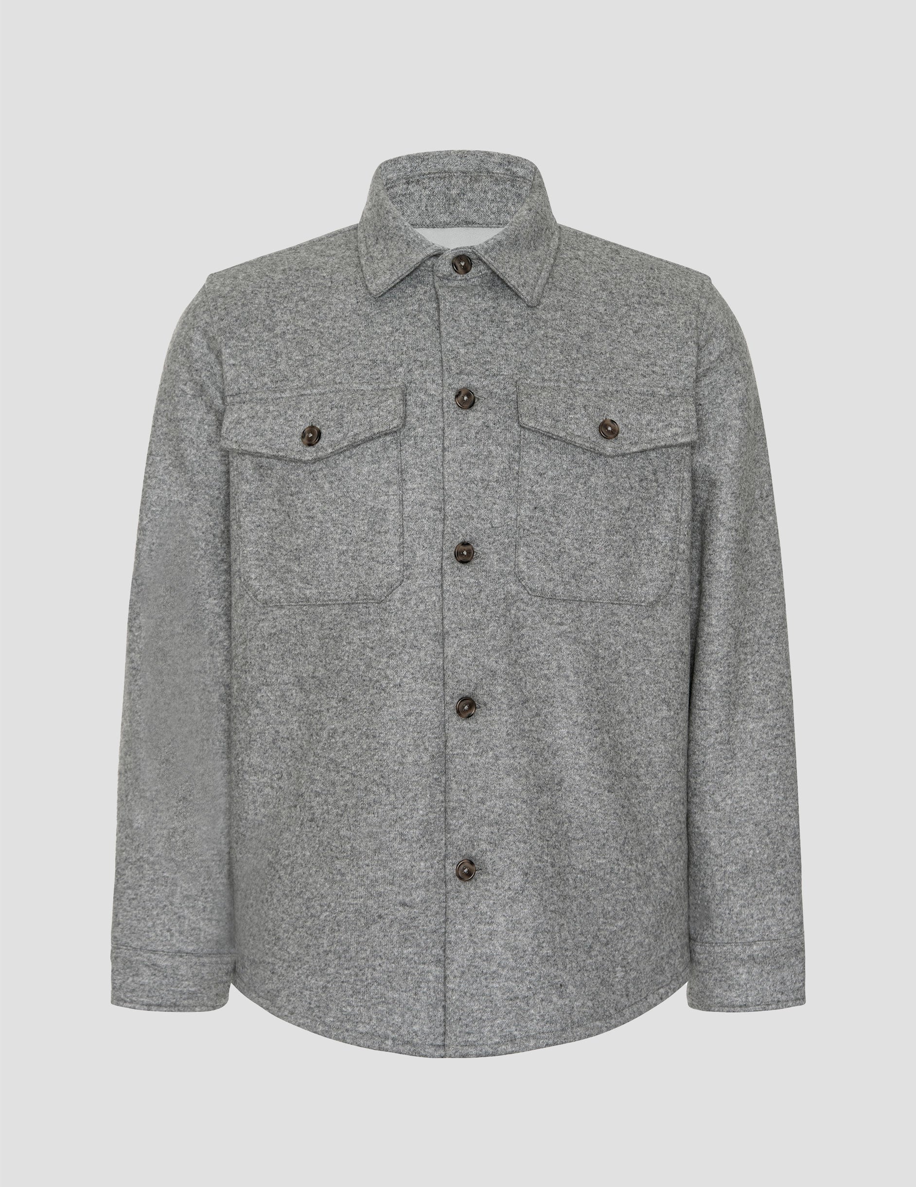 gray shirt jacket with button details on a light gray background.