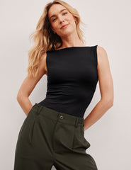 black boat neck tank top with a square back neckline.