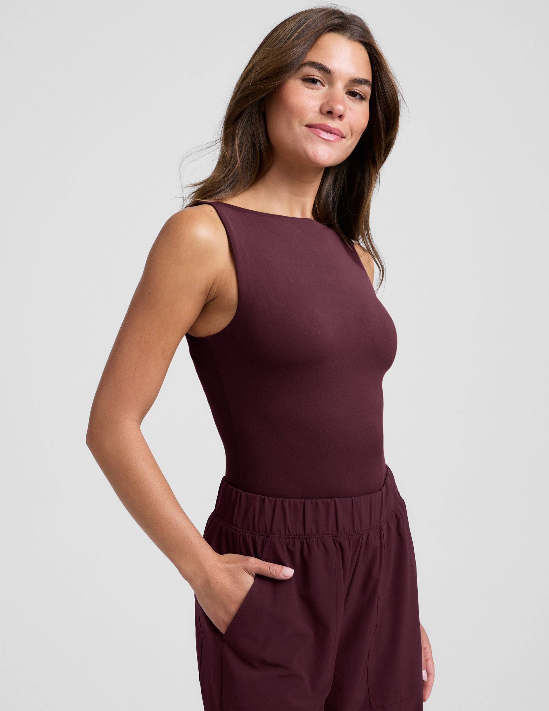 red boat neck tank top with a square back neckline.