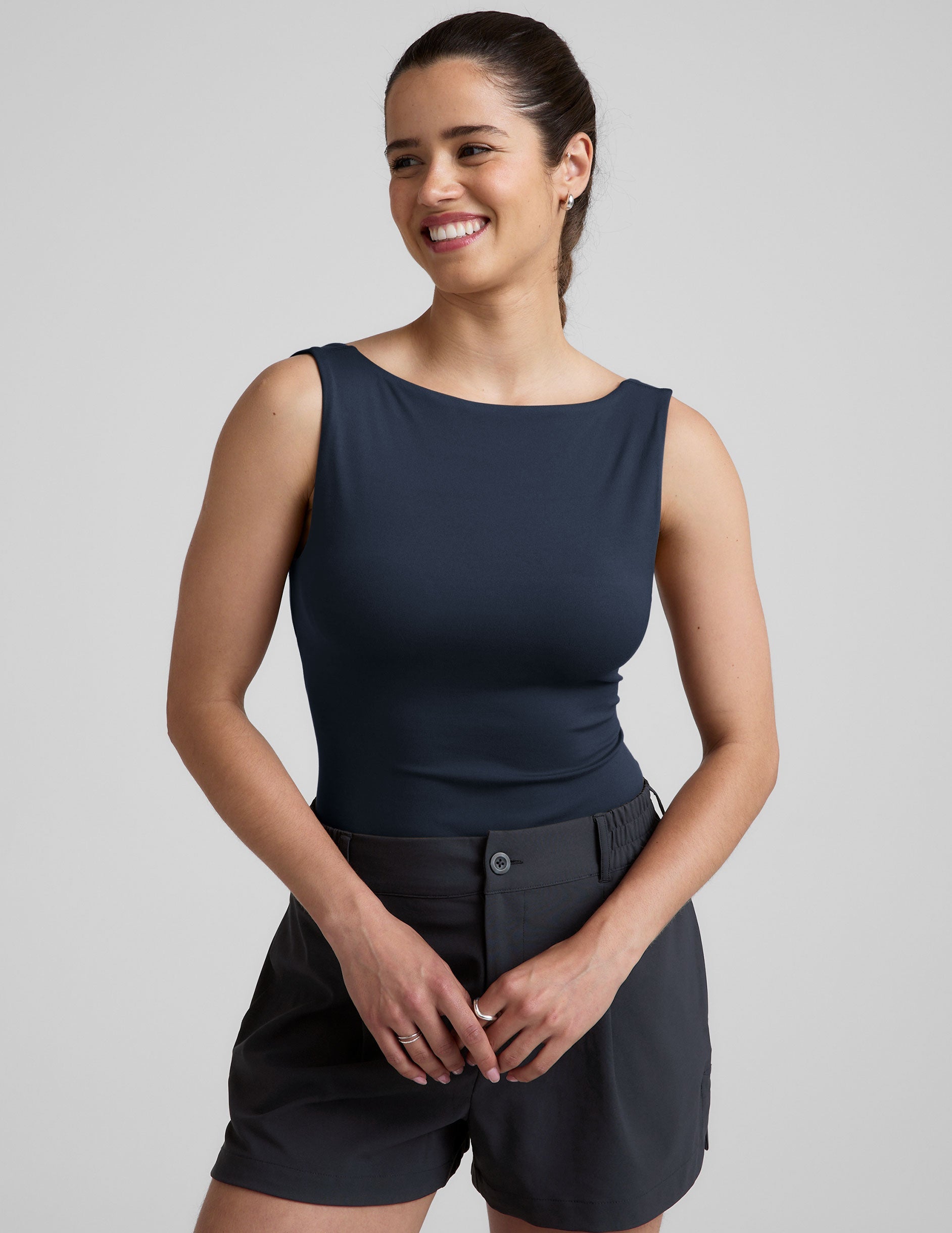 blue boat neck tank top with a square back neckline.