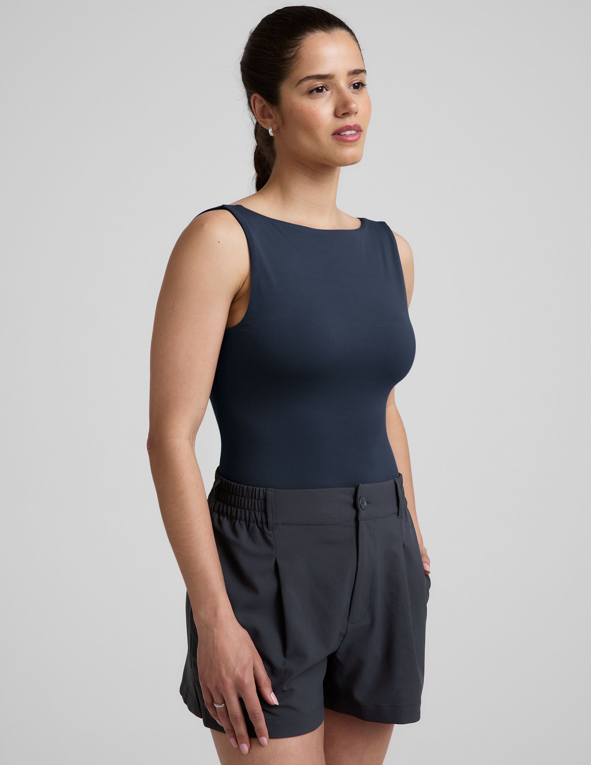 blue boat neck tank top with a square back neckline.