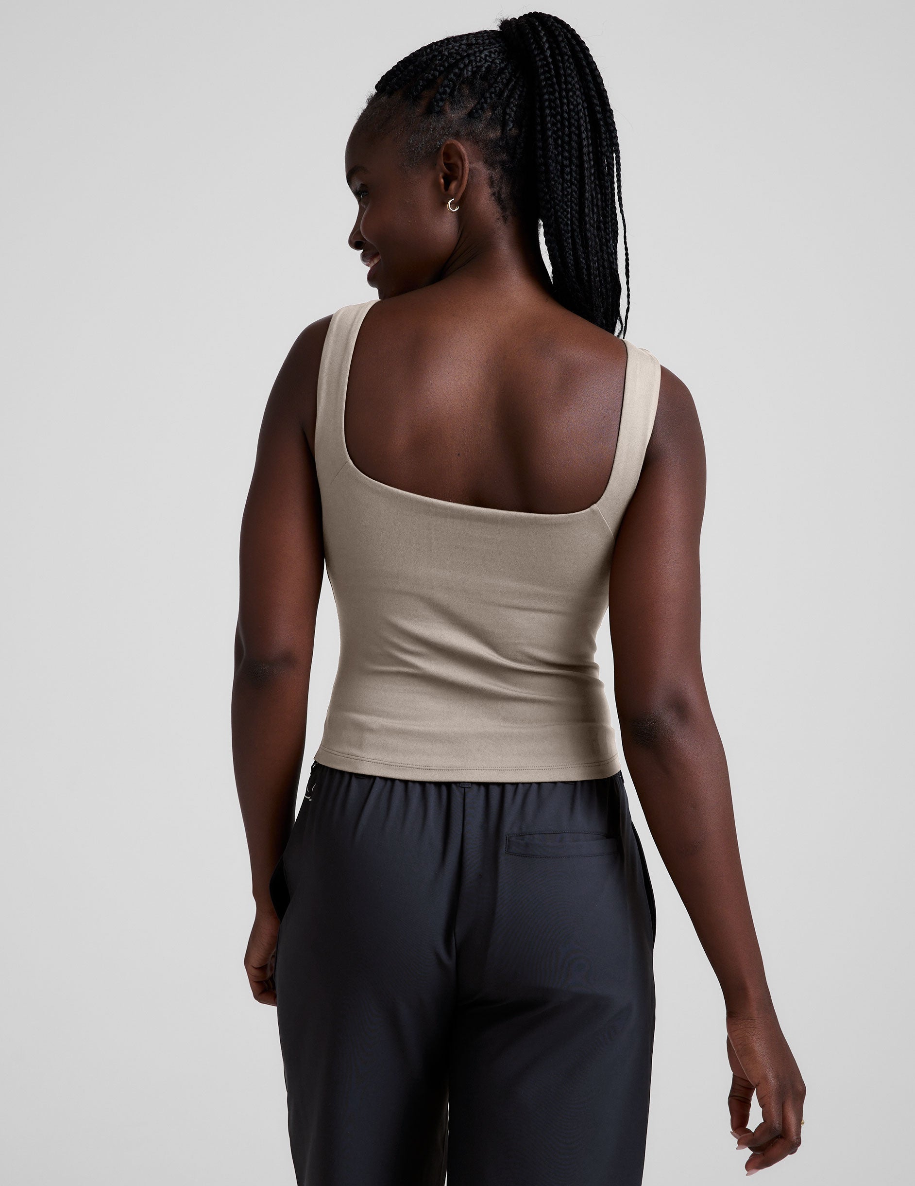 brown boat neck tank top with a square back neckline.