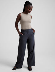 brown boat neck tank top with a square back neckline.