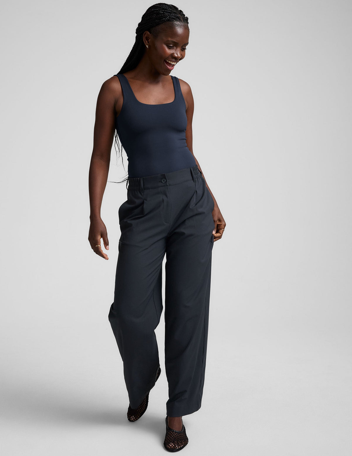blue mid-rise wide leg pant with pockets.