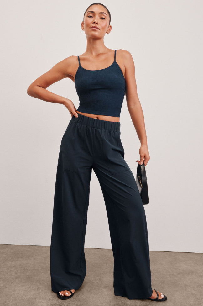 blue mid-rise 29" inseam wide leg pant with pockets. 