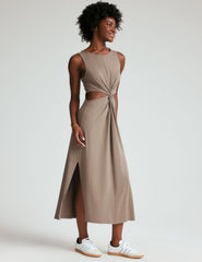 brown tank midi dress with cutouts and a twist detailing at waist and side slits.