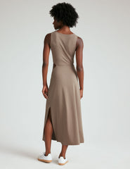 brown tank midi dress with cutouts and a twist detailing at waist and side slits.