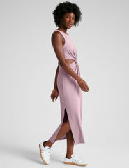 pink midi length tank dress with a scoop neckline and cutouts at waistband.
