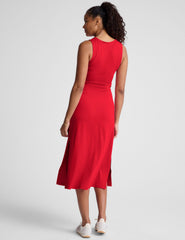 red midi length dress with a cutout detailing at waist.