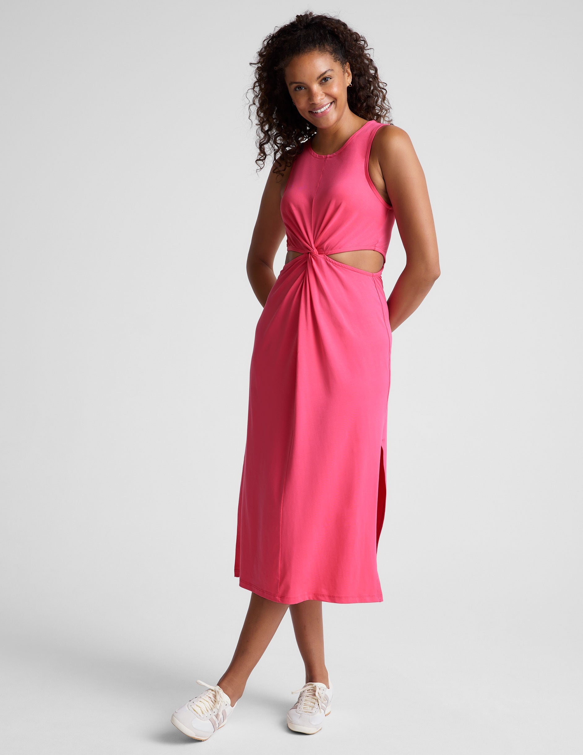 pink midi dress with a front twist detailing at waist.