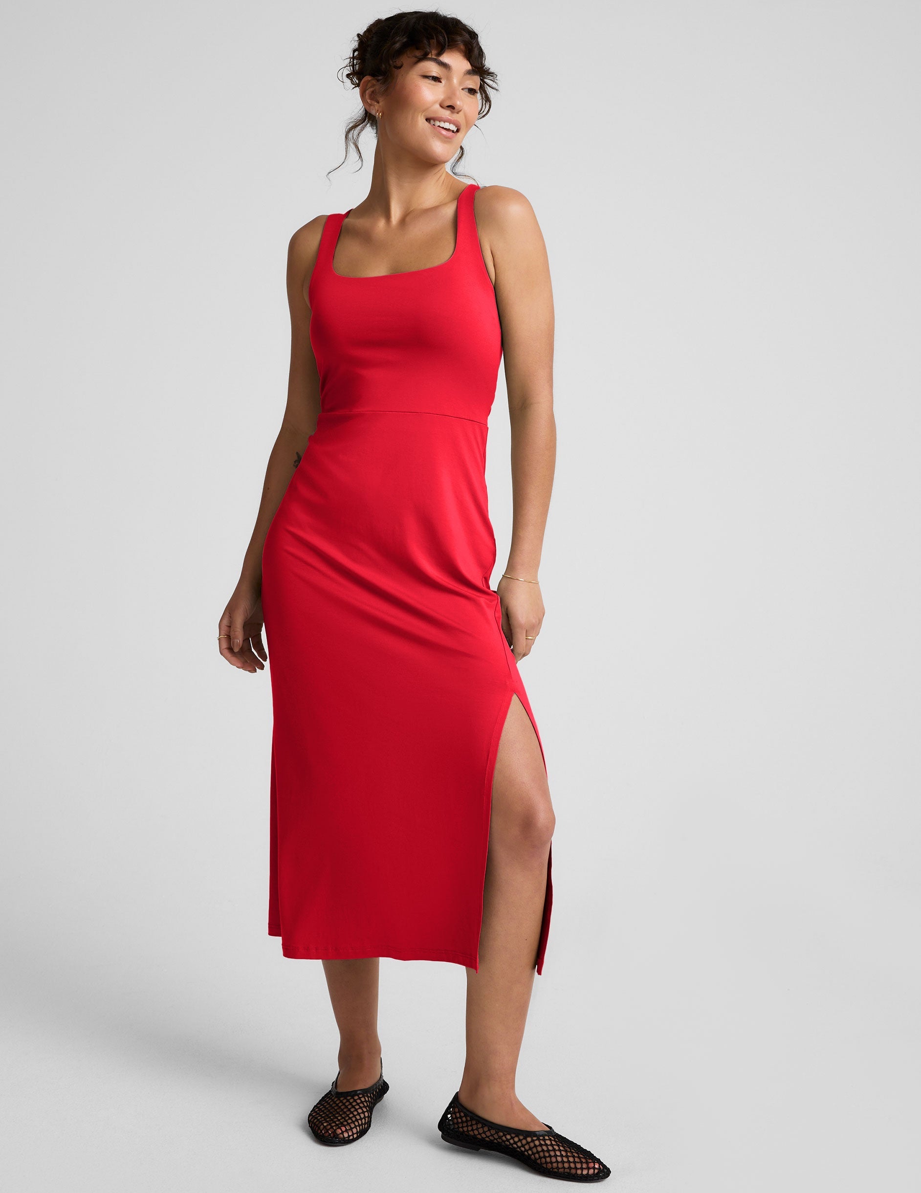 red square neck midi length dress with a front side slit.
