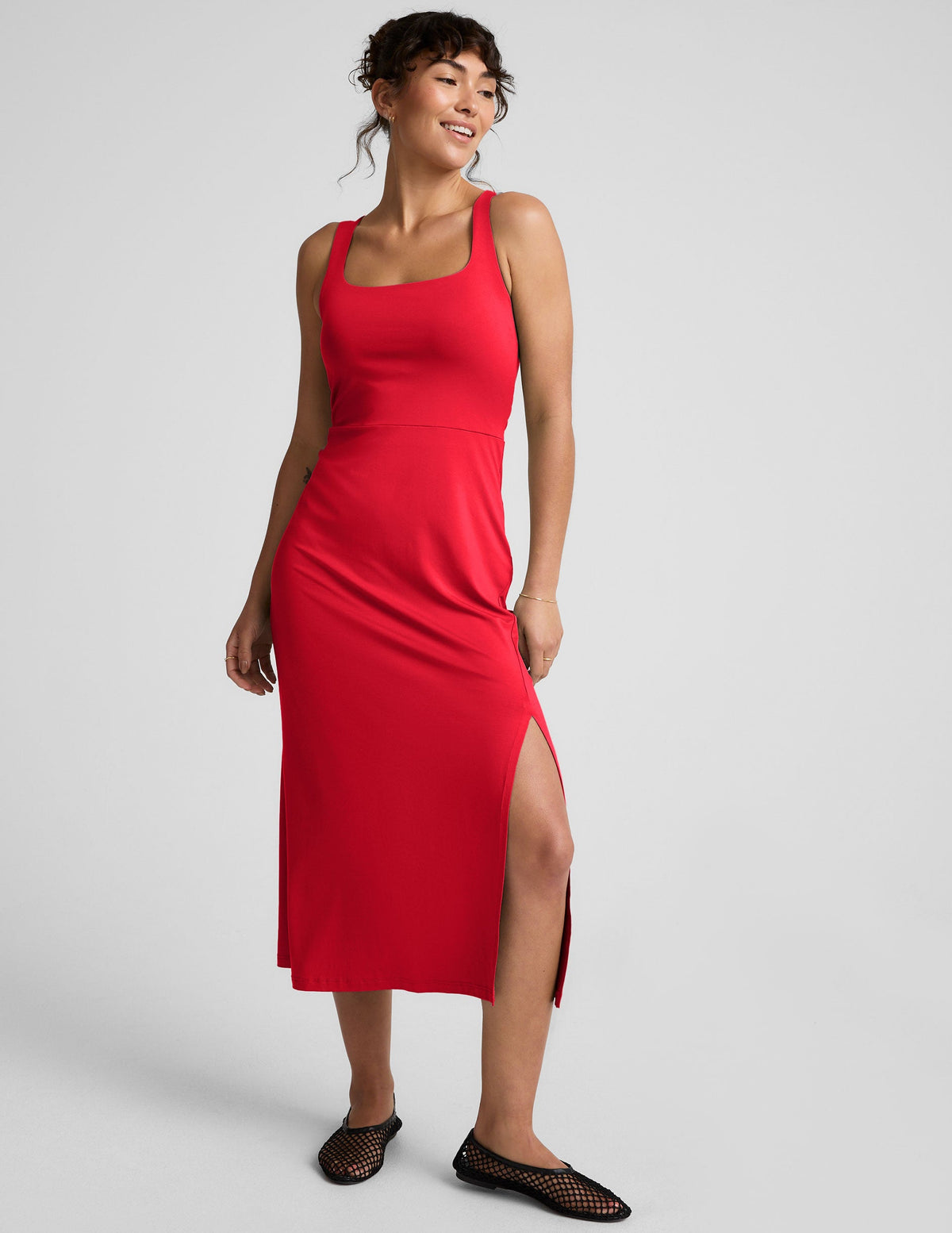 red square neck midi length dress with a front side slit.