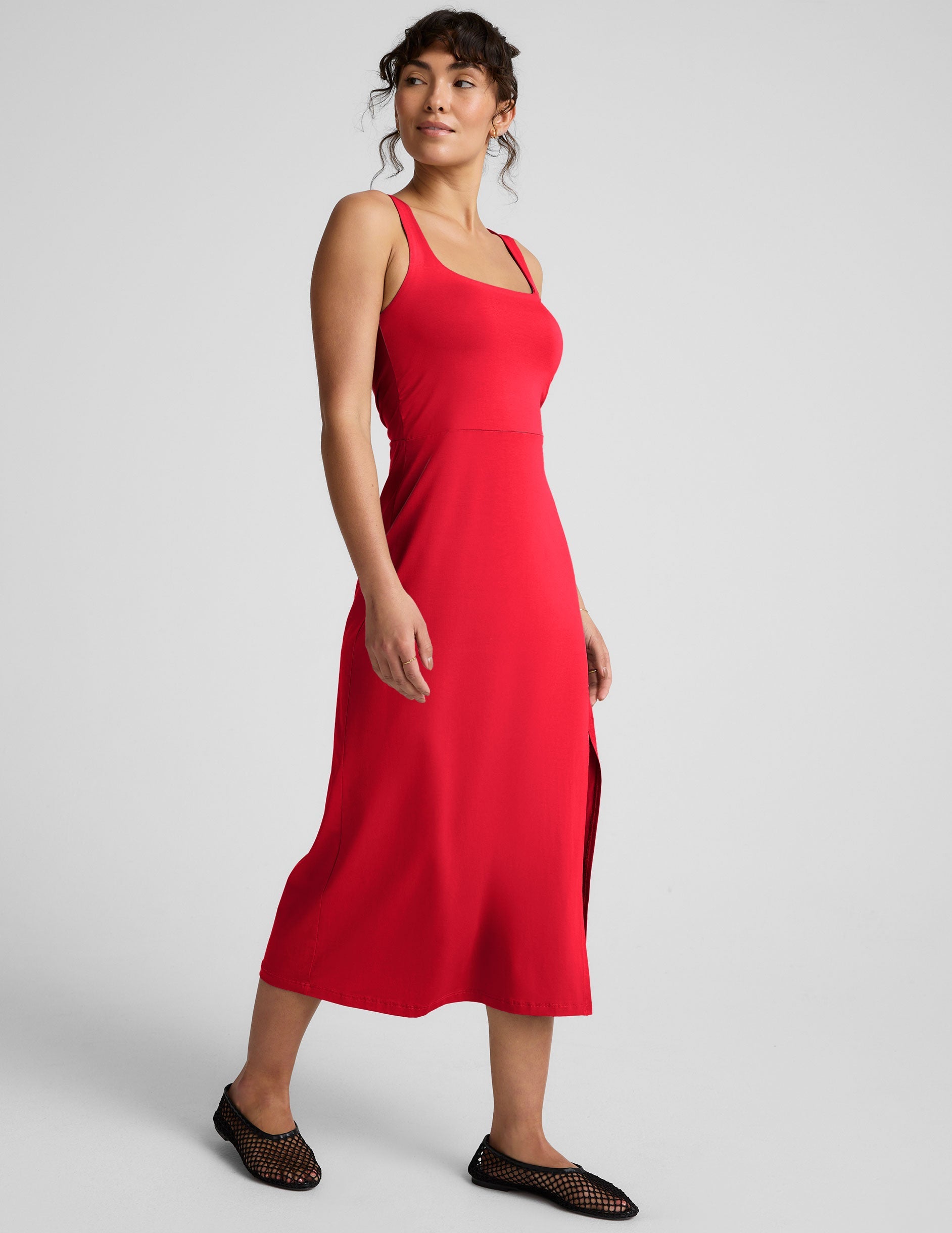 red square neck midi length dress with a front side slit.