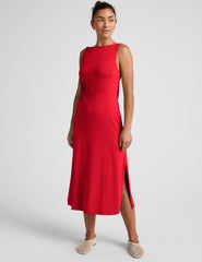 red midi dress with a bateau neck and side twist.